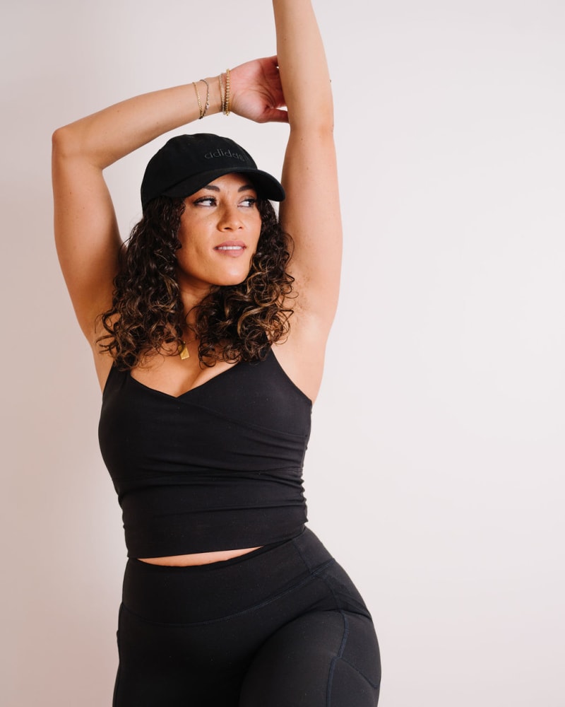 Front of a model wearing a size XL NEW! The Amya Tank in BLACK by Gold Elite Apparel. | dia_product_style_image_id:288241
